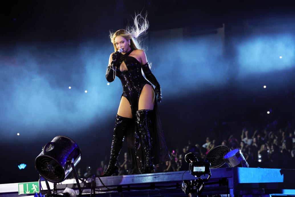 A photograph of Beyoncé performing onstage during the "RENAISSANCE WORLD TOUR" at GEHA Field at Arrowhead Stadium on October 01, 2023 in Kansas City, Missouri.