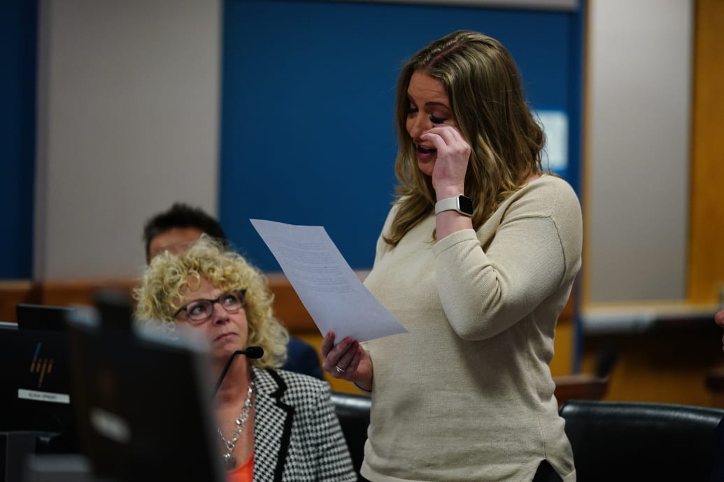 Jenna Ellis reads a statement after pleading guilty to a felony count of aiding and abetting false statements and writings, inside Fulton Superior Court.