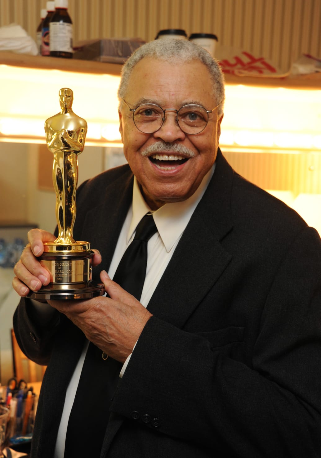 Legendary American actor James Earl Jones poses with his "Lifetime Achievement" Oscar that he received from Sir Ben Kinsley after his performance in "Driving Miss Daisy" on November 12, 2011