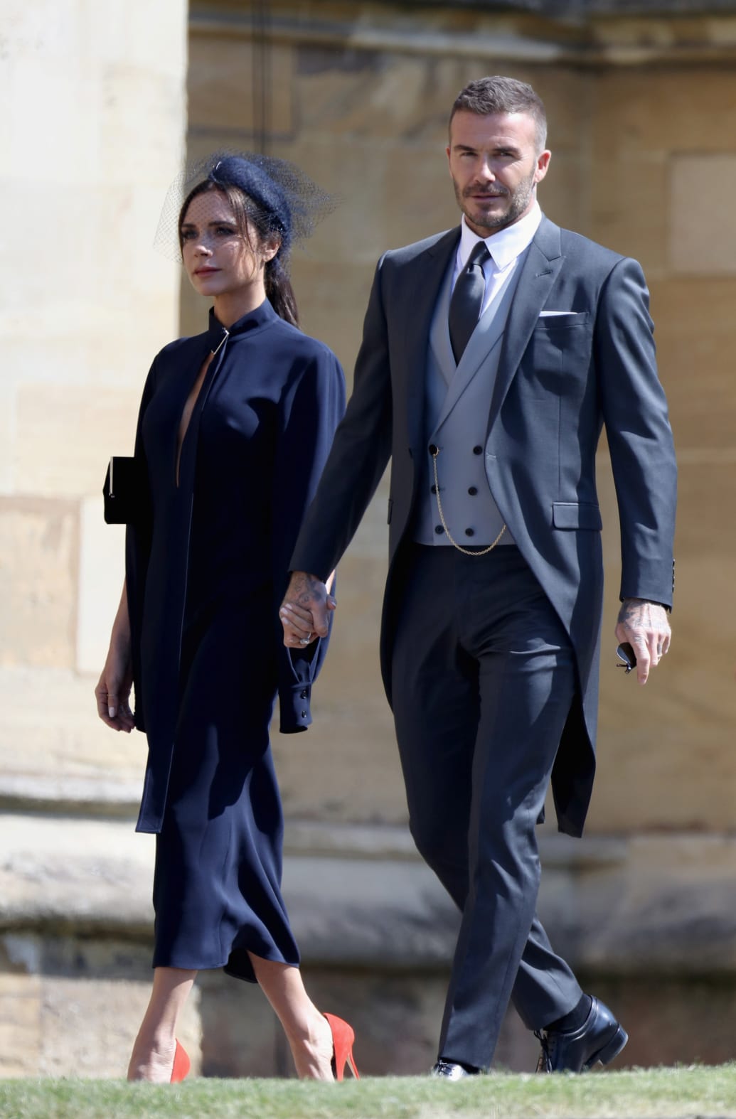 David and Victoria Beckham arrive at St George's Chapel at Windsor Castle for the wedding of Meghan Markle and Prince Harry. Saturday May 19, 2018.
