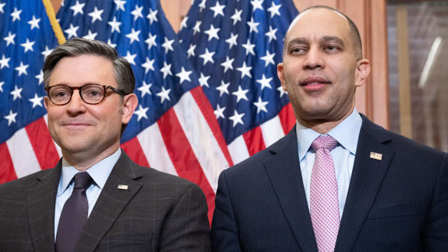 US Speaker of the House Mike Johnson (L), Republican of Louisiana, and US House Democratic Leader Hakeem Jeffries (R), Democrat of New York at the US Capitol in Washington, DC, March 12, 2024. 