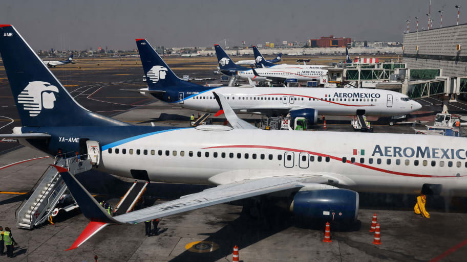 Jets of Mexican flag carrier airline Aeromexico are parked at Mexico City's Benito Juarez International Airport on January 30, 2023.