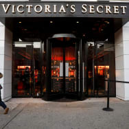 A shopper passes by a Victoria's Secret retail store, as the global outbreak of the coronavirus disease (COVID-19) continues, in Brooklyn, New York, U.S., December 8, 2020.