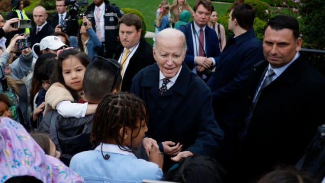 U.S. President Joe Biden greets guests during the White House Easter Egg Roll on the South Lawn.