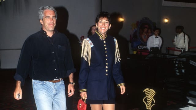 Jeffrey Epstein and Ghislaine Maxwell attend the “Batman Forever” premiere.