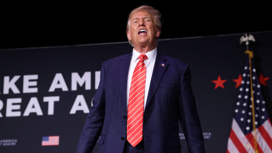 Donald Trump yells to the crowd after speaking during a campaign rally in Sioux City, Iowa, Oct. 29, 2023. 