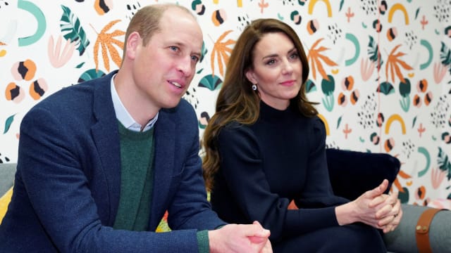 Prince William and Kate Middleton listen to young adults during a visit to the Open Door Charity in Birkenhead, Britain January 12, 2023.