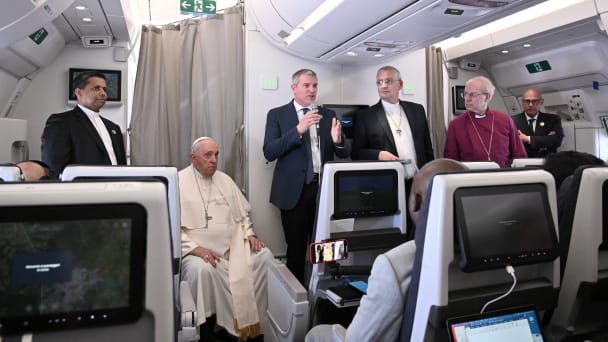 Archbishop of Canterbury Justin Welby, Pope Francis and Church of Scotland's Iain Greenshields address the media on the papal plane.