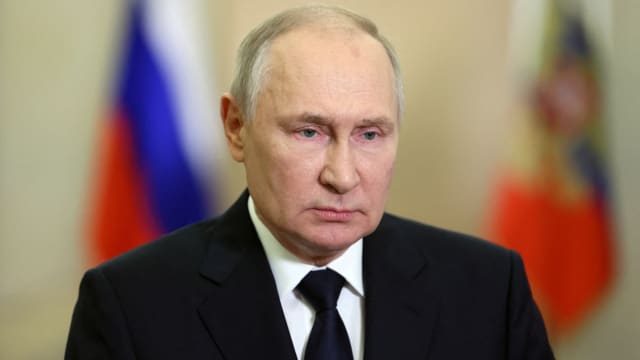 Russian President Vladimir Putin gives a televised address in Moscow, Russia, in this picture released September 30, 2023.
