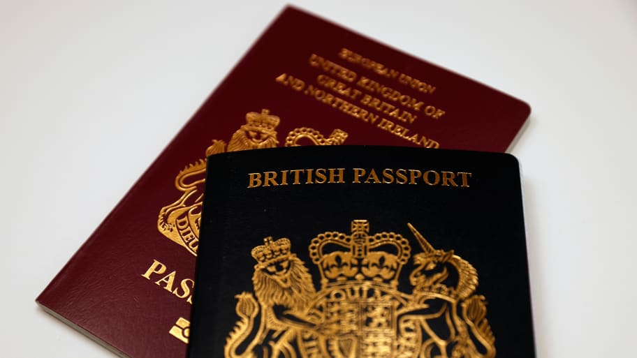 Current and previous European Union versions of British passports are seen in this illustration photograph taken December 11, 2020. 