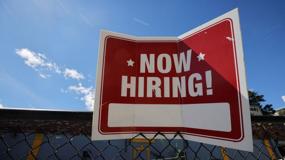 A Now Hiring sign in Sommerville, Massachusetts.