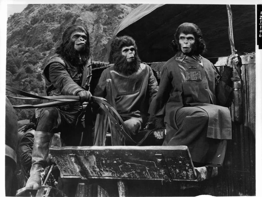 A still from Planet of the Apes showing apes on a cart