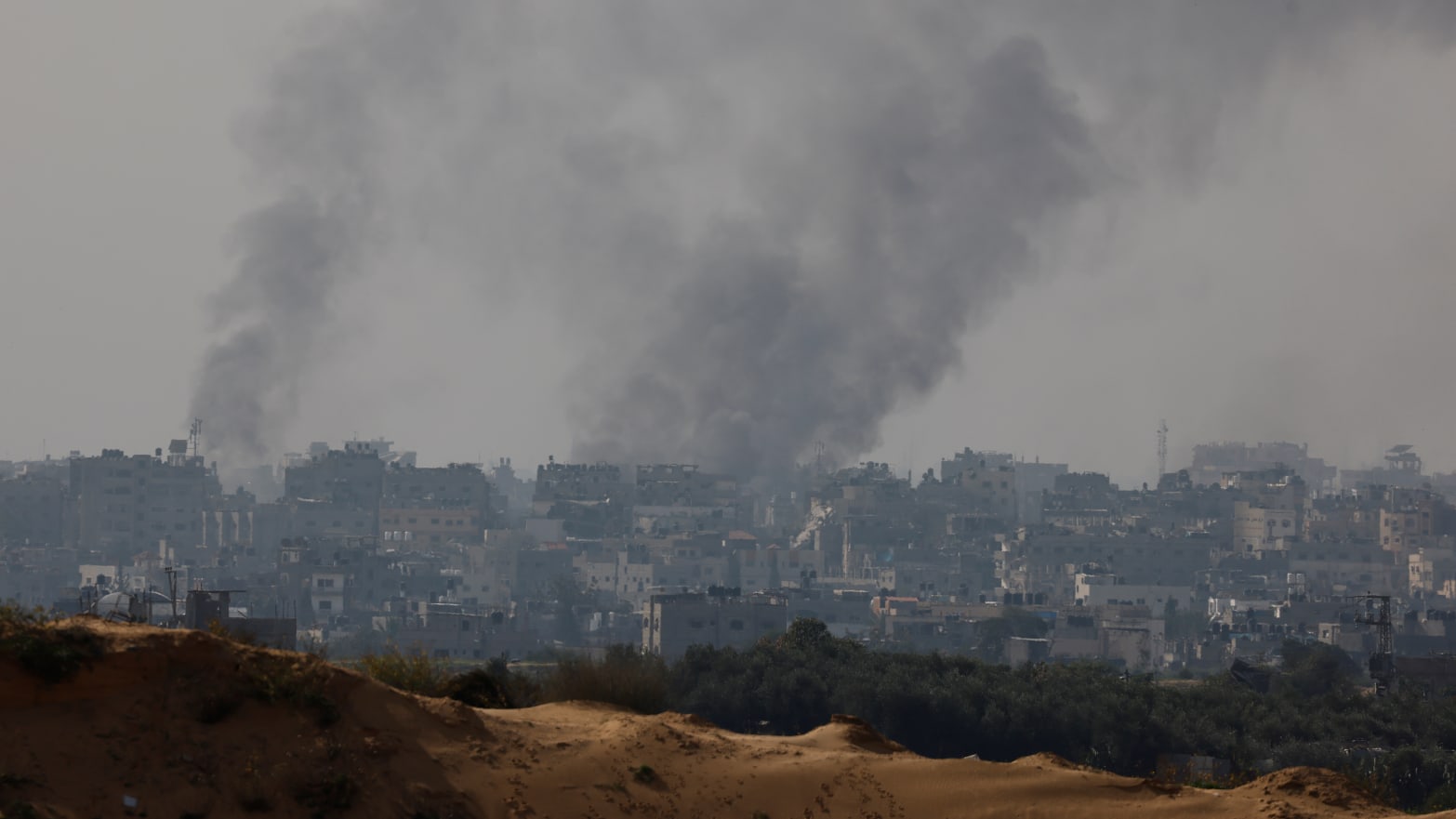 Smoke rises over Gaza, amid the ongoing conflict between Israel and the Palestinian Islamist group Hamas, as seen from southern Israel, December 8, 2023. 