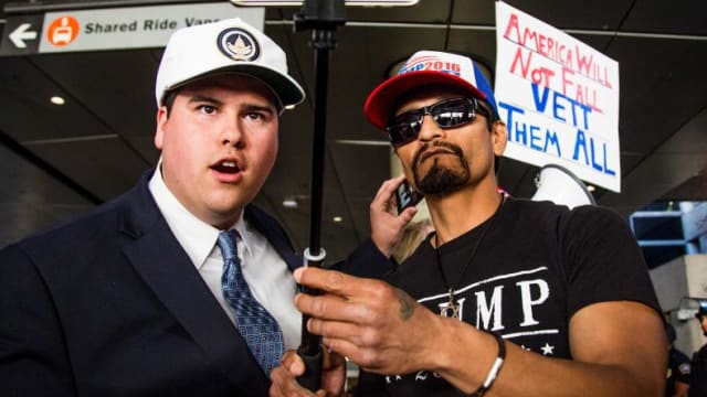 Omar Navarro talks during a live stream at a protest in Los Angeles.