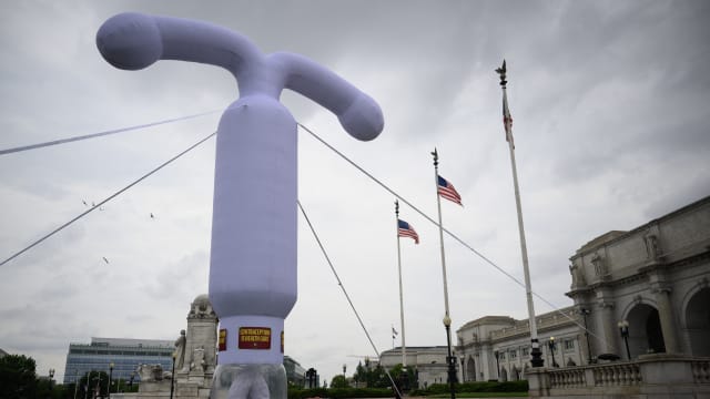 A 20-foot (6-meter) tall inflatable intrauterine device (IUD) stands outside of Union Station in Washington, DC