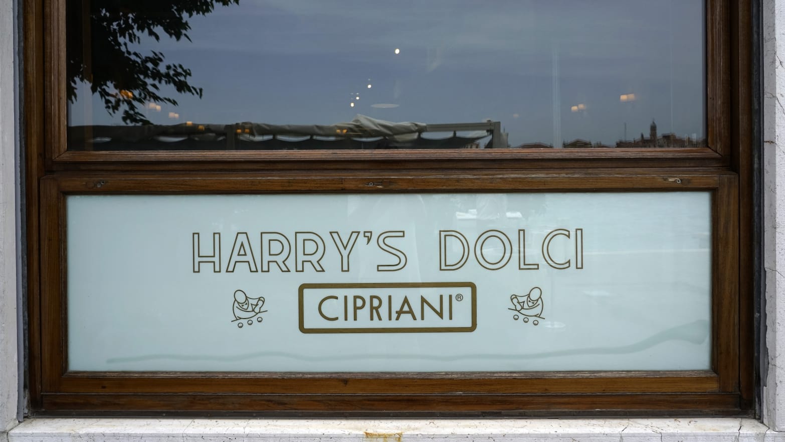 Shop window of Harry's Dolci Restaurant. Fondamenta di San Biagio. Giudecca. Venice.