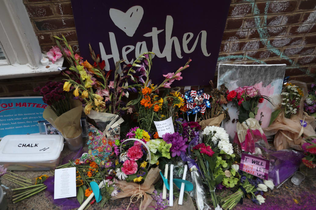 Flowers and messages are left at a memorial to Heather Heyer ahead of the one year anniversary of 2017 Charlottesville "Unite the Right" protests, in Charlottesville, Virginia, U.S., August 11, 2018.