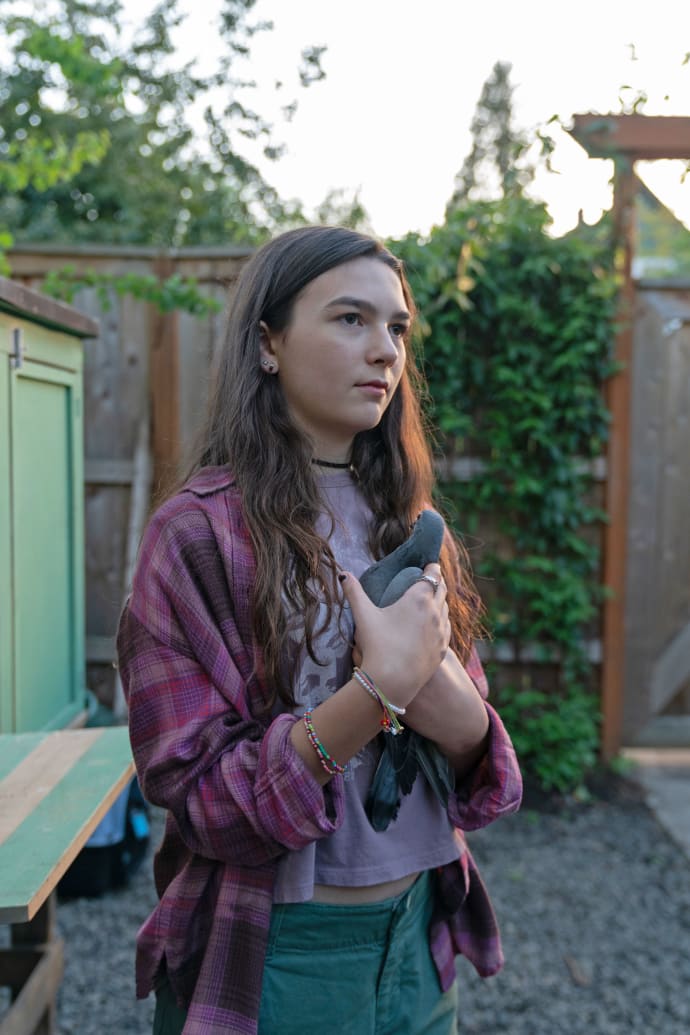 Brooklynn Prince holds a pigeon in a still from “Little Wing.”