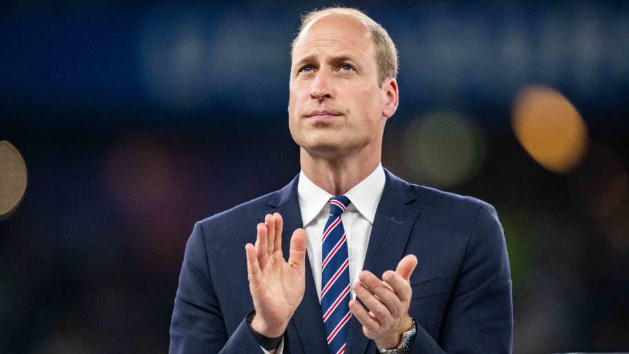 Prince William of Wales looks on as he stands on the stage before presenting medals after the UEFA EURO 2024 final match between Spain and England at Olympiastadion on July 14, 2024 in Berlin, Germany.