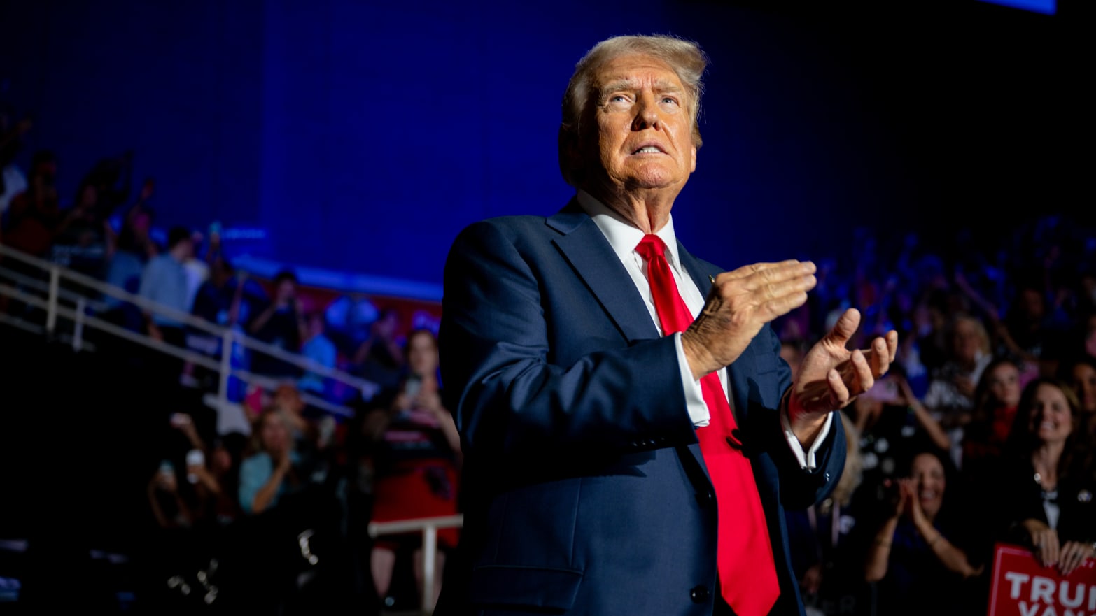 U.S. Republican Presidential nominee former President Donald Trump greets attendees upon arrival at his campaign rally at the Bojangles Coliseum on July 24, 2024 in Charlotte, North Carolina.