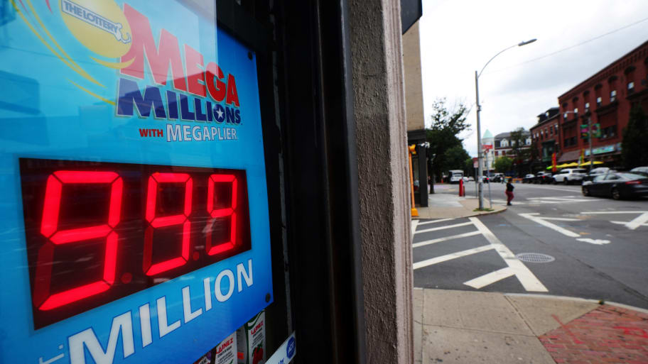 Mega Millions sign displays $999-million at a Massachusetts convenience store.