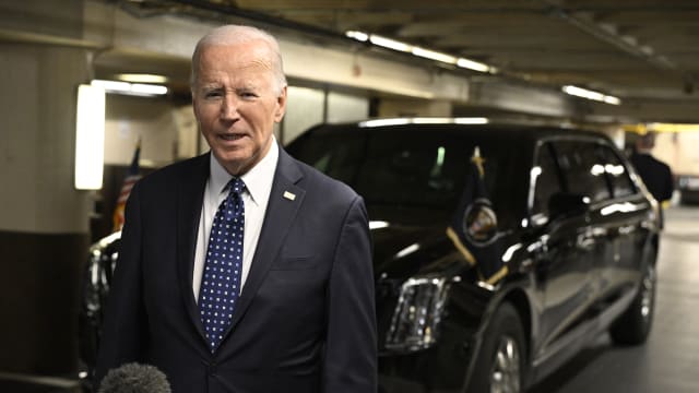 US President Joe Biden speaks to the press in the parking garage of the Fairmont Hotel in San Francisco, California, on February 22, 2024.