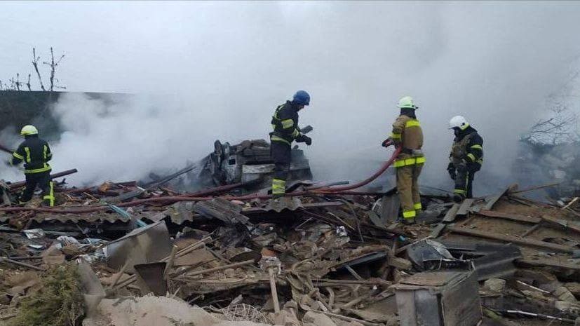 Firefighters work at the site of a residential area hit by a Russian military strike in the town of Pavlohrad, Dnipropetrovsk region, Ukraine, May 1, 2023. 