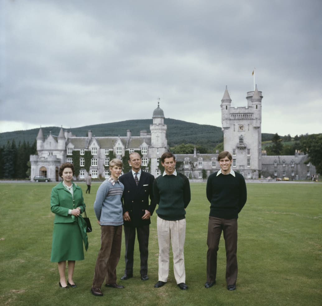 Queen Elizabeth II with Prince Philip, the Duke of Edinburgh and their sons Prince Edward (second from left), Prince Charles (second from right) and Prince Andrew (right) in the grounds of Balmoral Castle in Scotland, UK, 20th September 1979.