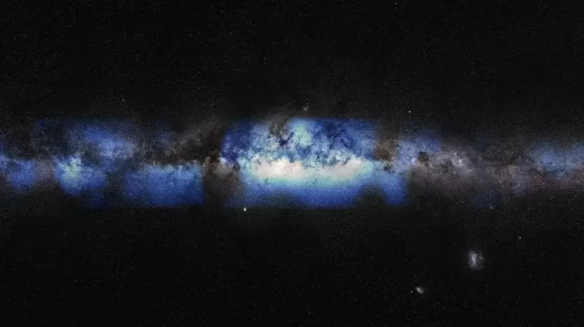 An artist's composite image of a photo of the Milky Way captured with visual light along with the first-ever neutrino-based image of the Milky Way. 