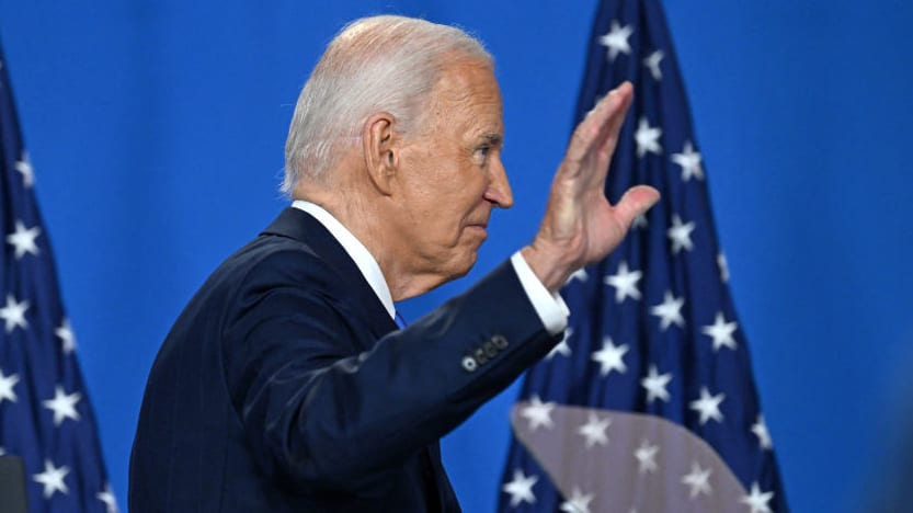 President Joe Biden waves as he leaves after speaking during a press conference at the close of the 75th NATO Summit in Washington, DC.
