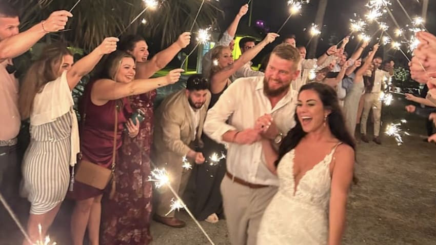 Samantha Miller and Aric Hutchinson on their wedding day