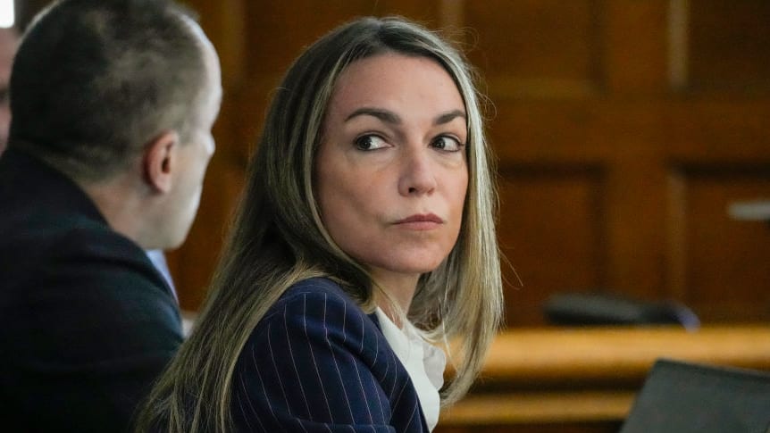 Karen Read looks at the gallery during her murder trial at Norfolk Superior Court.