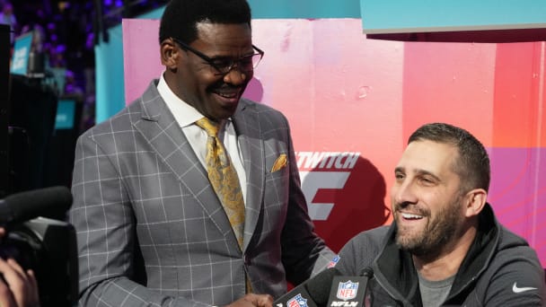 NFL Network reporter Michael Irvin speaks with Philadelphia Eagles head coach Nick Sirianni during Super Bowl Opening Night at Footprint Center.