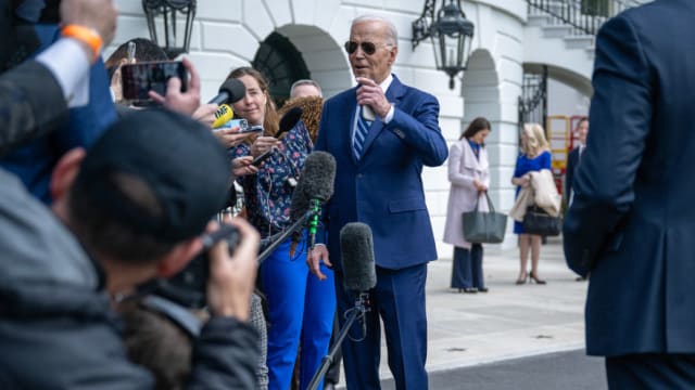 U.S. President Joe Biden speaks to reporters before boarding Marine One on the South Lawn of the White House.
