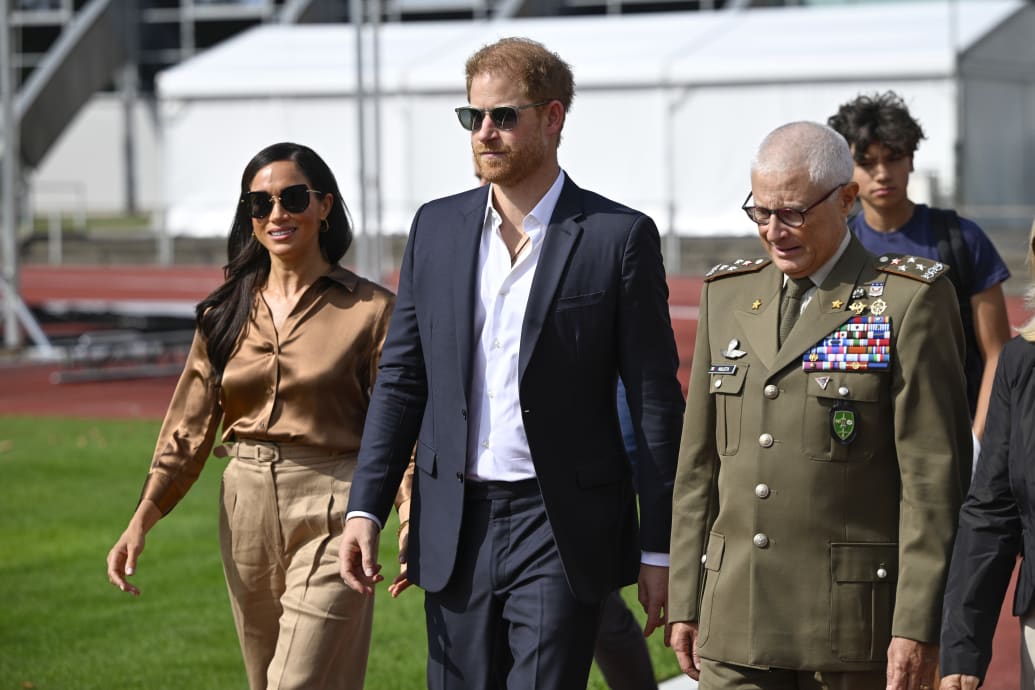 Meghan, Duchess of Sussex, Prince Harry, Duke of Sussex meet with General Luigi Miglietta and NATO Joint Force Command and families from Italy and Netherlands during day five of the Invictus Games Düsseldorf 2023 in Duesseldorf, Germany.