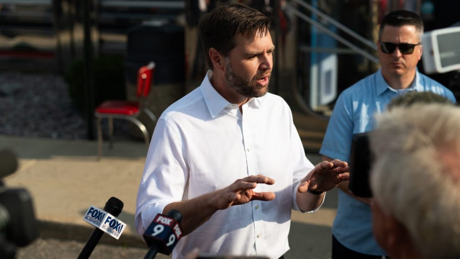 Republican vice presidential nominee U.S. Sen. J.D. Vance (R-OH) speaks with media gathered outside the Park Diner in St Cloud, Minnesota.