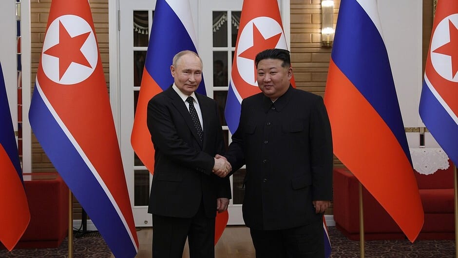 Russian President Vladimir Putin (L) shakes hands with Chairman of State Affairs of the Democratic People's Republic of Korea (DPRK) Kim Jong-un (R)