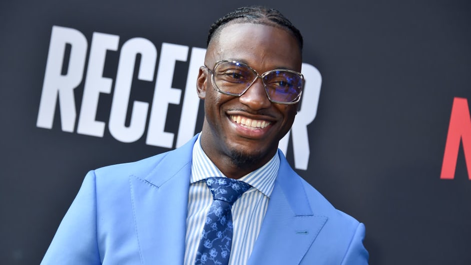 Robert Griffin III smiles outside a premier.