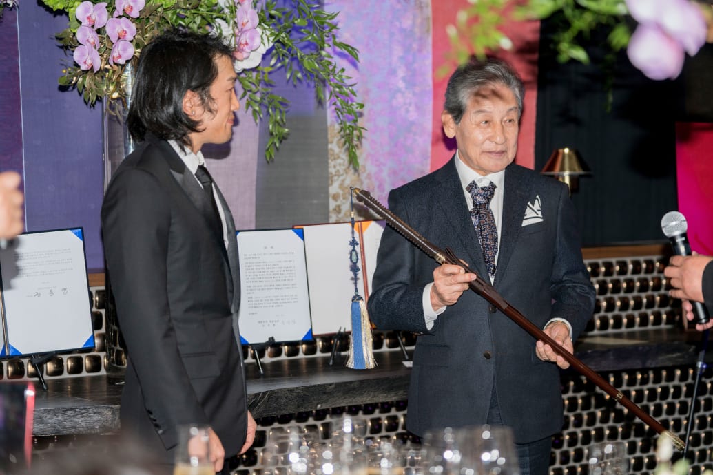 Photograph from the Passing of Sword ceremony at the Crustacean on Oct 16, 2018, with Andrew Lee and King Yi Seok.