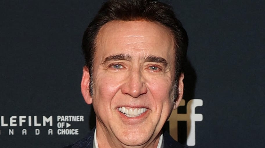 Nicolas Cage smiles on a red carpet for Telefilm Canada