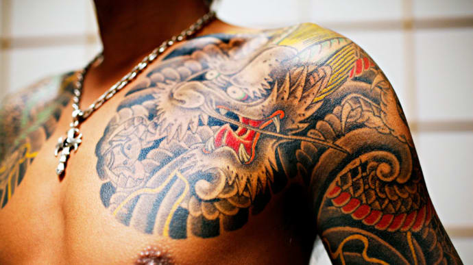 https://img.thedailybeast.com/image/upload/c_crop,d_placeholder_euli9k,h_539,w_960,x_0,y_0/dpr_auto/c_limit,w_690/f_auto,q_auto/v1/galleries/2011/03/17/yakuza-tattoos/yakuza-tattoos-3_e0chok