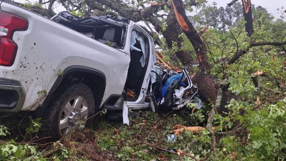 Parents Marvin Wayne Baker and Lindy Baker were seriously injured when their truck was tossed by a tornado, but their young son Branson was miraculously unharmed.