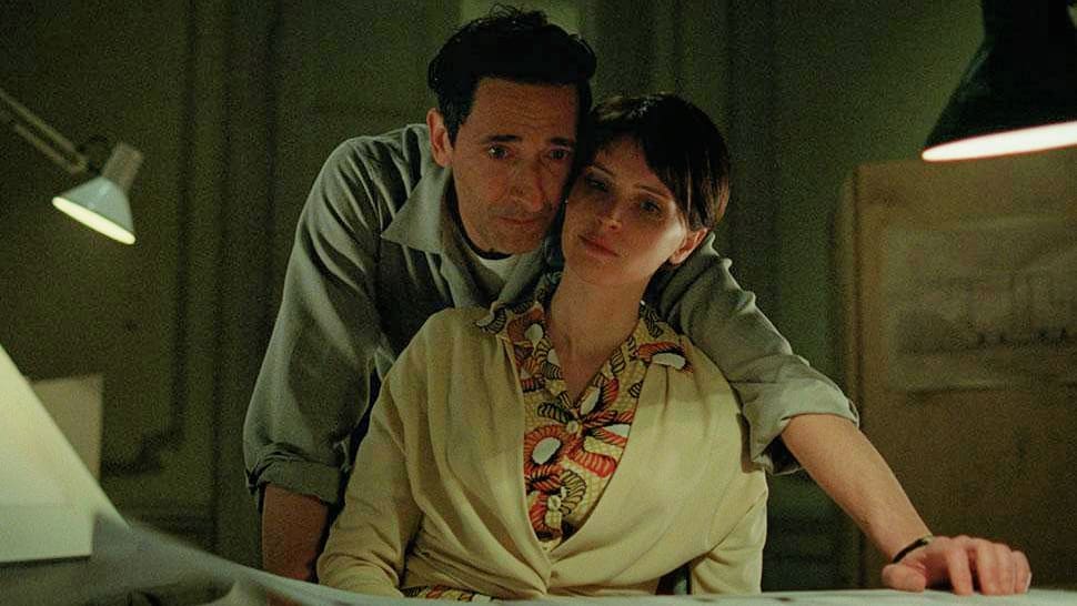 A photo still of Adrien Brody and Felicity Jones