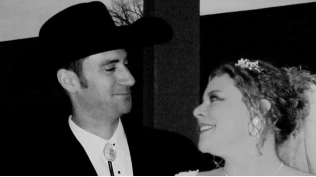David and Sarah Schultz smile together in an undated, black-and-white photo.
