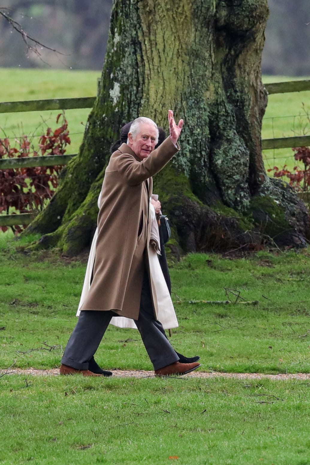 Britain's King Charles waves as he arrives for a church service at St. Mary Magdalene's church on the Sandringham estate in eastern England, Britain, February 11, 2024.