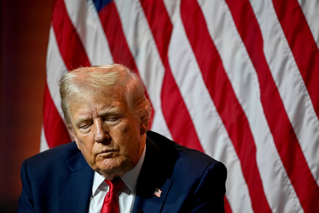 Republican presidential nominee and former U.S. President Donald Trump closes his eyes during a panel of the National Association of Black Journalists (NABJ) convention in Chicago, Illinois, U.S. July 31, 2024.