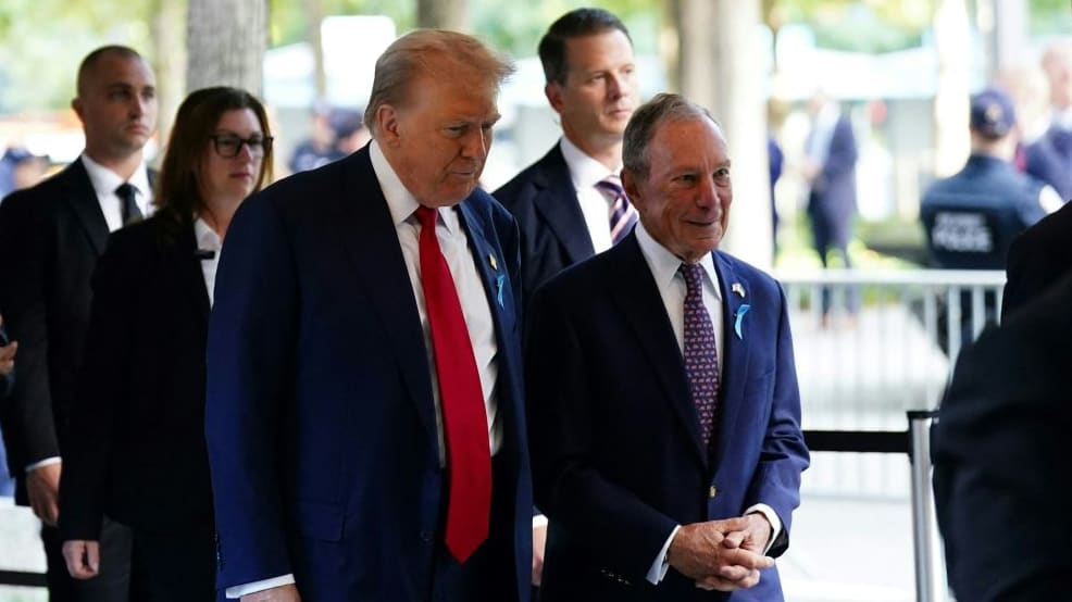 Donald Trump, left, and former Mayor of New York Michael Bloomberg attend a remembrance ceremony on the 23rd anniversary of the September 11 terror attack on the World Trade Center.