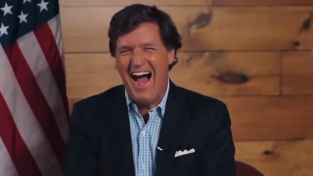 An image of Tucker Carlson from his interview with Donald Trump