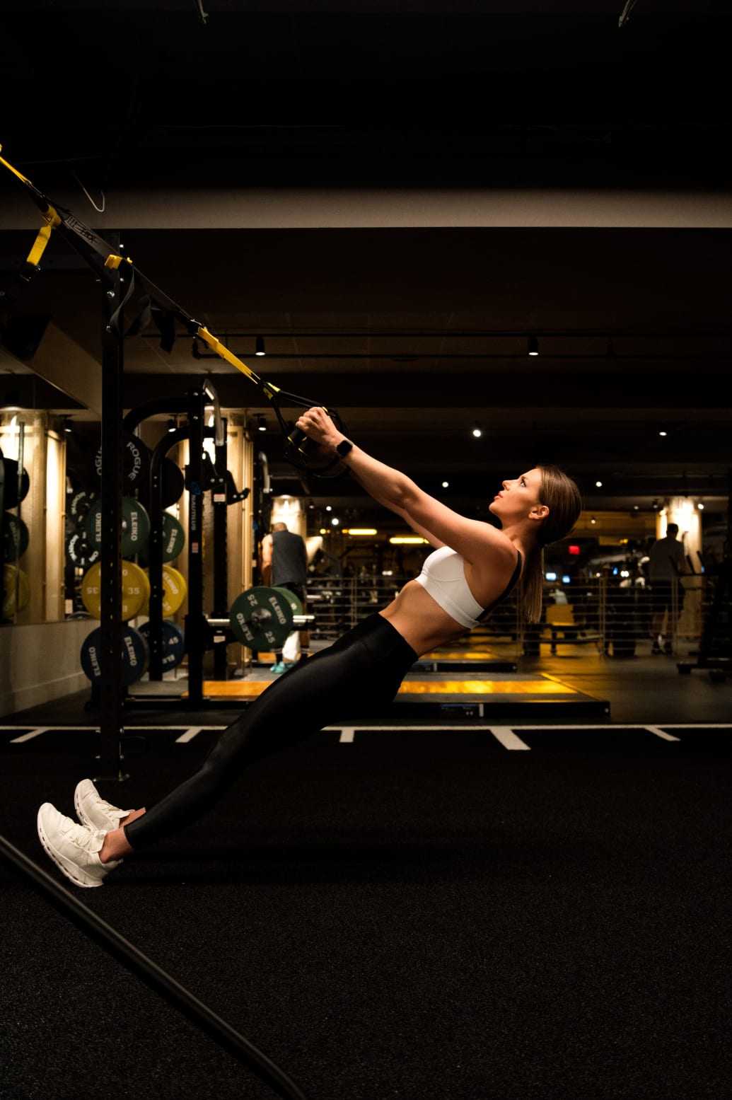 A photograph of Megan Lange training in a gym.