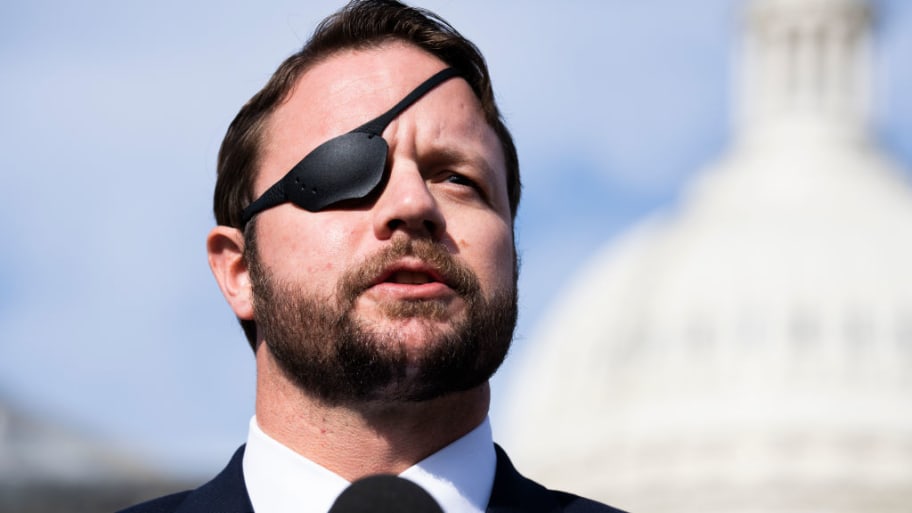 Rep. Dan Crenshaw, R-Texas, attends a news conference to introduce the Crucial Communism Teaching Act outside the U.S. Capitol on Thursday, December 2, 2021